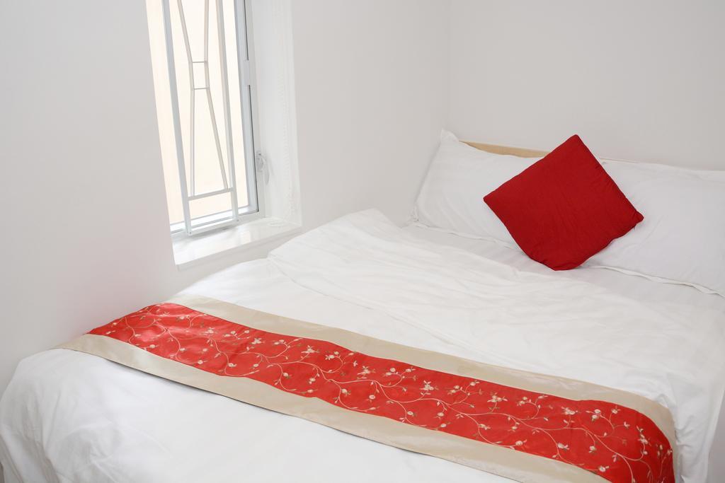 Sunrise International - Boutique Hostel Цзюлун Экстерьер фото